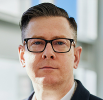 Headshot d'Alexandre Hughes, PDG d'une société de trading crypto